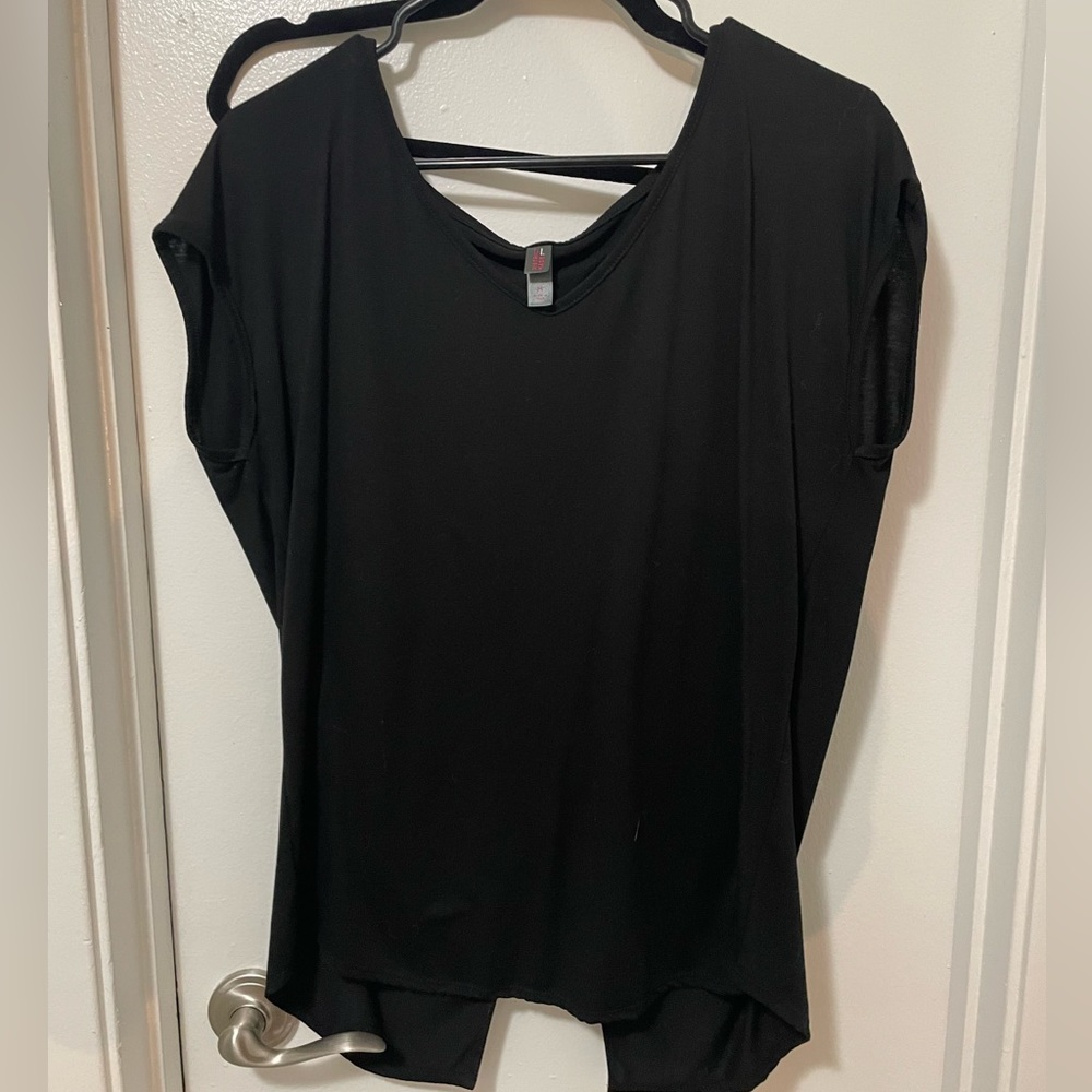 Open back black top